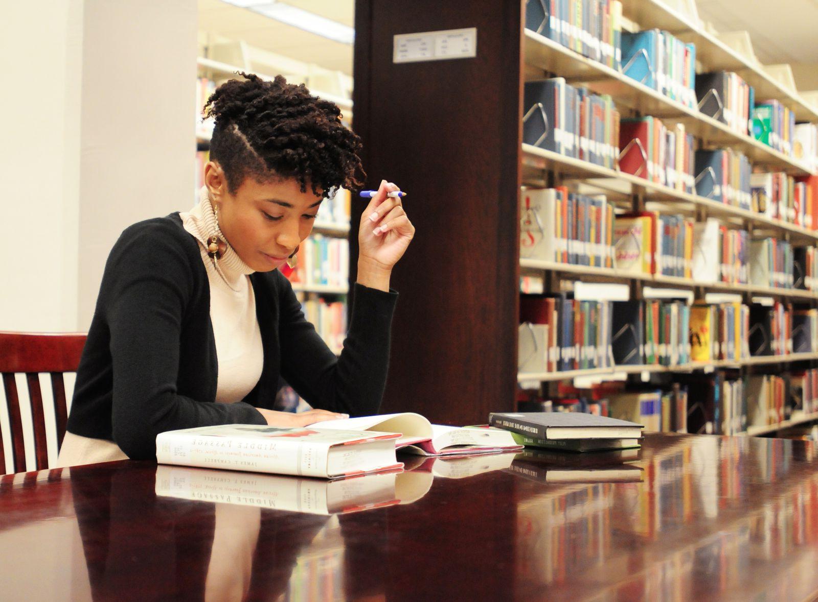 Female student studying in library